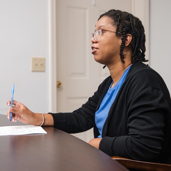 A young woman speaks with a specialist during a vocational evaluation at Opportunity Center-Easterseals.